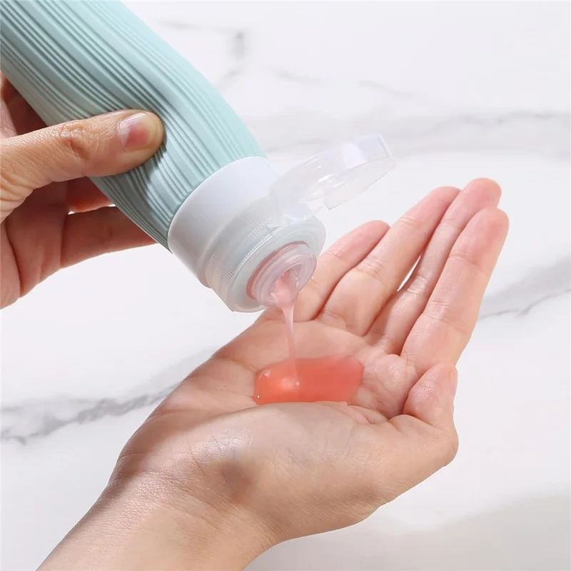 4-teiliges Set Reiseflaschen 90 ml, Silikon-Refill-Druckflaschen, auslaufsicher für Shampoo, Lotion – Rosa