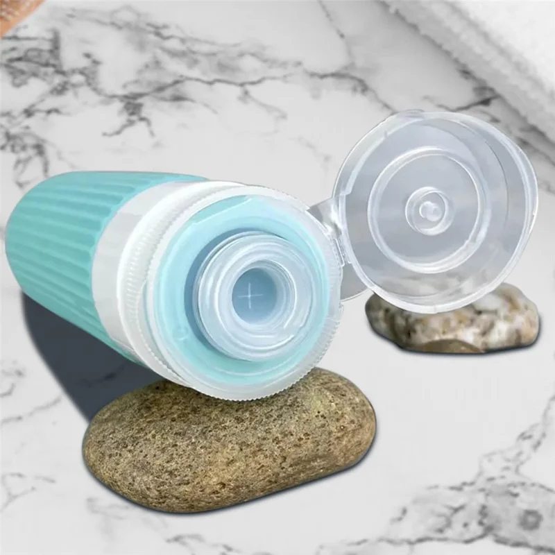 4-teiliges Set Reiseflaschen 90 ml, Silikon-Refill-Druckflaschen, auslaufsicher für Shampoo, Lotion – Rosa