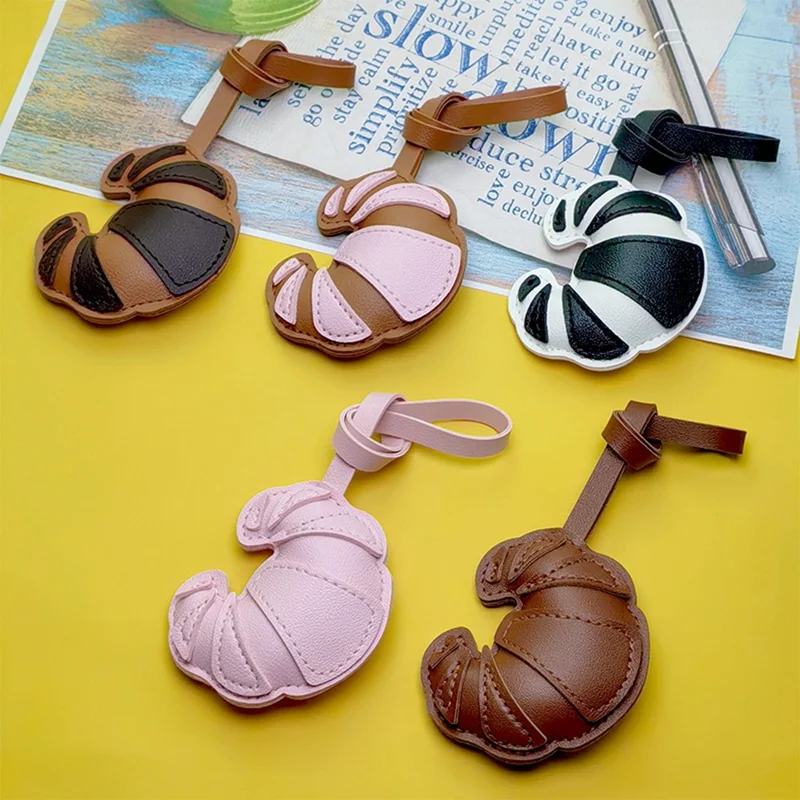 Kreatywny brelok w kształcie croissanta z sztucznej skóry PU, uroczy wisiorek na torbę w kształcie bułki, zawieszka - biały / czarny