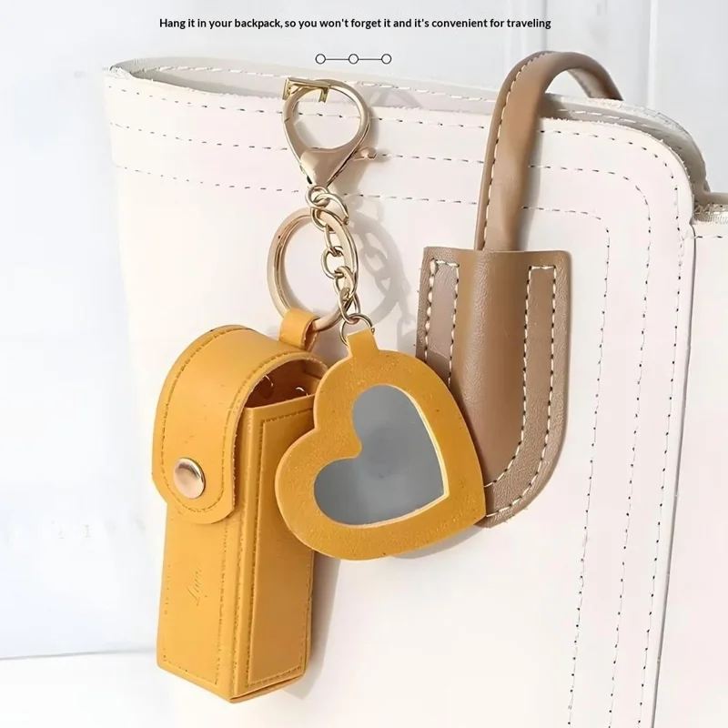 Schlüsselanhänger-Design Tragbare Lippenstifttasche mit Herzspiegel-Anhänger aus PU-Leder, Mini-Make-up-Beutel für unterwegs, täglich - Rot