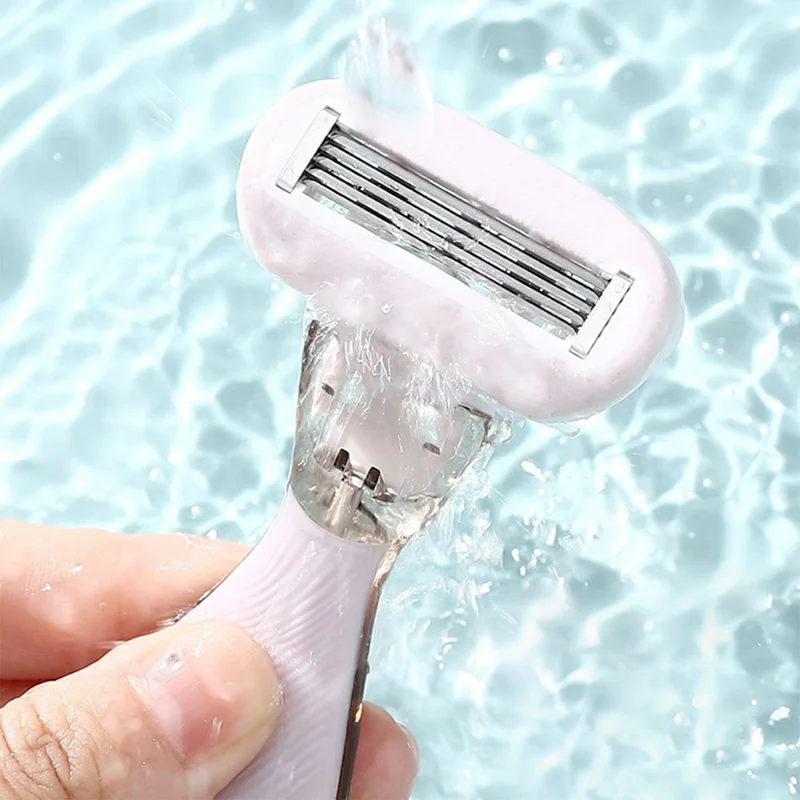 Rasoio manuale per la rimozione dei peli per donna, Rasoio portatile per bikini e corpo, 1 manico + 2 testine - Rosa
