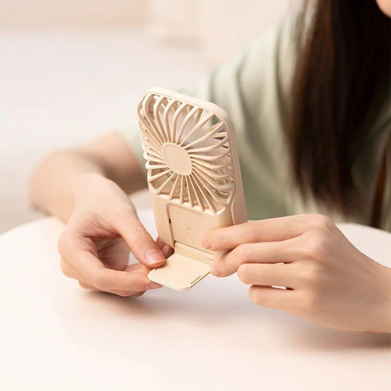 S-F30 Mini Desktop Handheld Fan Cooler Ultra Thin Summer Cooling Fan with Wrist Strap - Beige