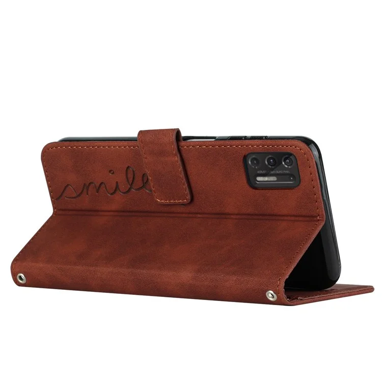 For Motorola Moto G Stylus 4G (2021) Skin-touch Feeling Heart Shape Imprinted Phone Case Drop Resistant PU Leather Wallet Stand Shell with Strap - Brown
