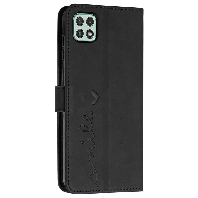 Para Samsung Galaxy A22 5G/A22s 5G (Versión UE) Piel al tacto Sensación Corazón Forma Grabada Manos libres Soporte Funda de Teléfono Cartera de Cuero PU con Correa - Negro