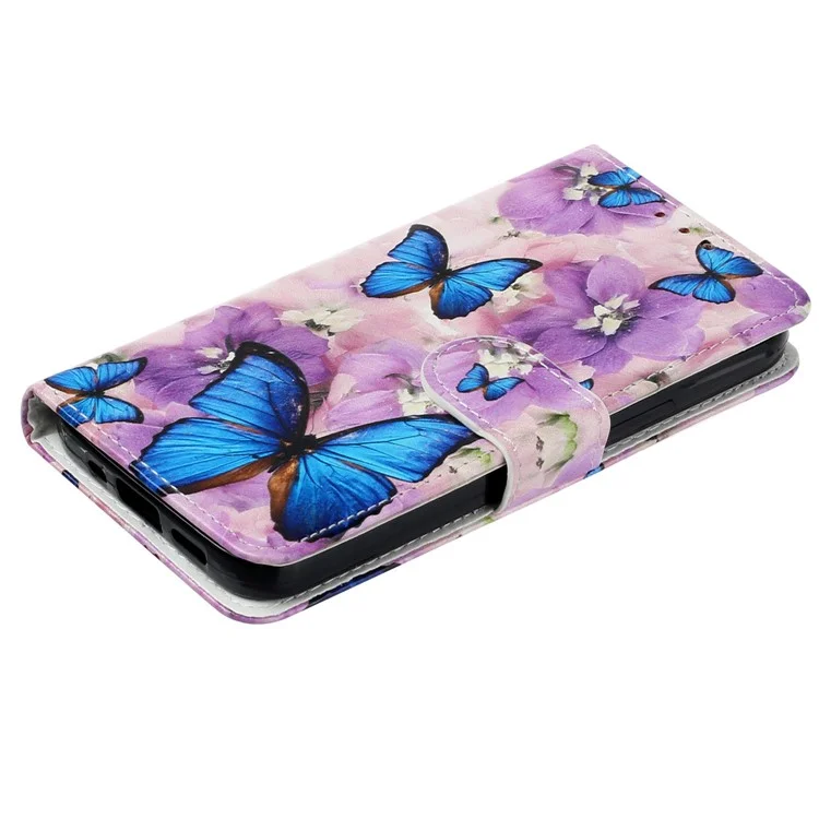 For iPhone 14 Pro 6.1 inch Pattern Embossed Phone Cover PU Leather TPU Full Protection Stand Wallet Case with Hand Strap - Purple Flower / Blue Butterfly