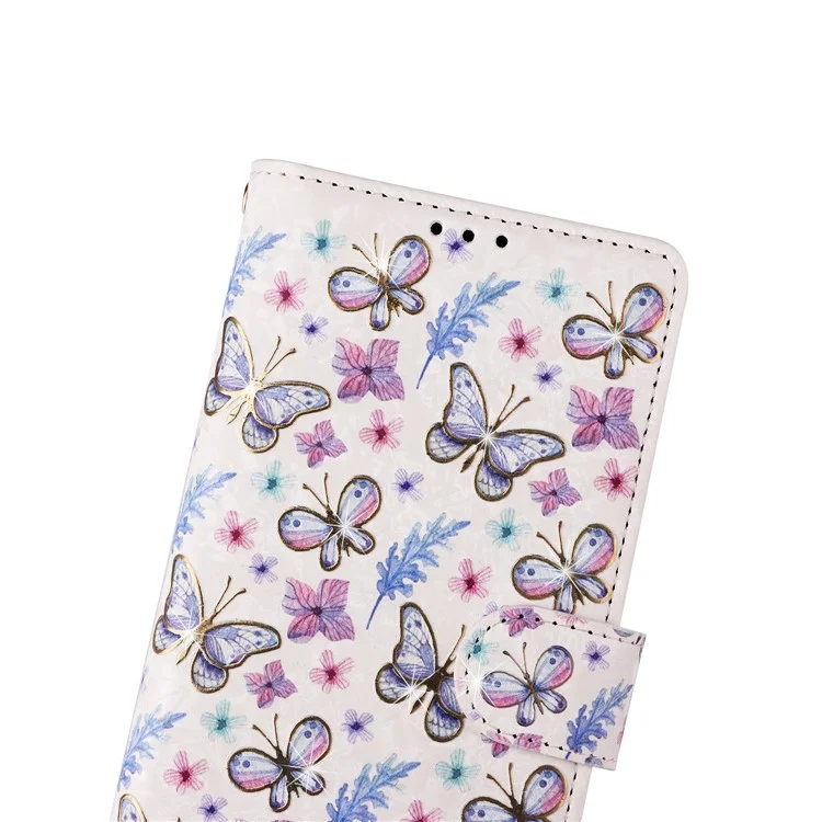 Für Samsung Galaxy A04e 4G / F04 4G / M04 4G Hülle mit Handschlaufe, RFID-blockierendes Lederhandy-Cover - Schmetterlings-Blume
