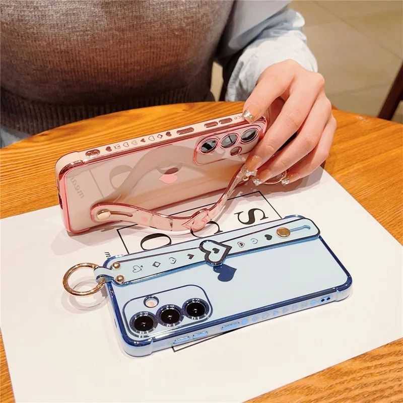 Para la funda Samsung Galaxy S24 Case TPU Cubierta de teléfono Diseño de corazón chapado con muñequera - Rosa