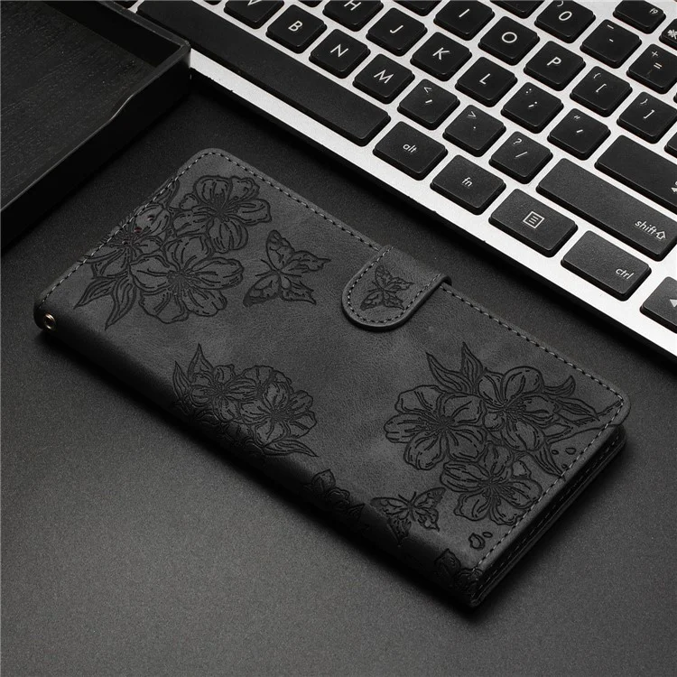 Für Samsung Galaxy A06 Case Butterfly Flower Pattern Skin-Touch Leather Phone Cover - Schwarz