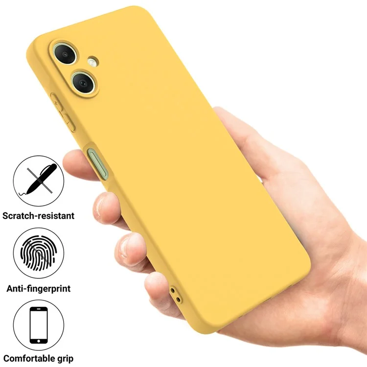 For Samsung Galaxy A06 4G Case Liquid Silicone Anti-Scratch Phone Cover with Hand Strap - Yellow