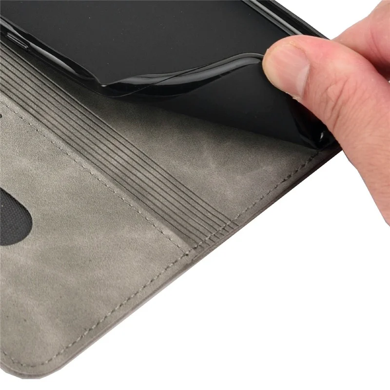 Para Asus Zenfone 9 5G Estuche de teléfono antideslizante con empalme Funda de cuero PU Piel magnética de absorción automática Sensación de piel de contacto Funda de cartera de teléfono con soporte - Gris