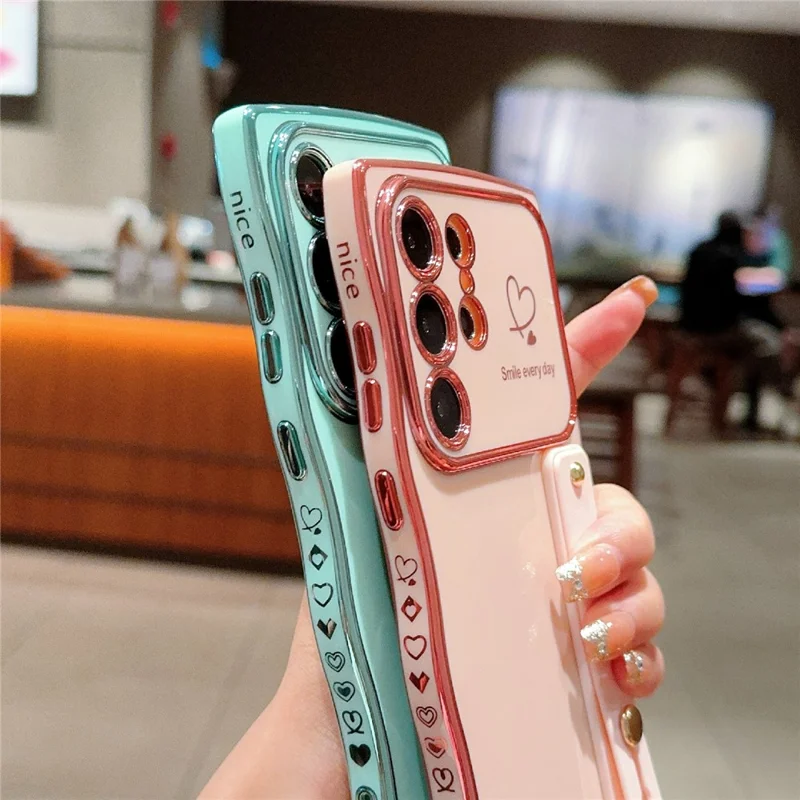 Для Samsung Galaxy S24 Ultra Case Case Love Heart Electrated TPU Phone Cope с Подставкой Для Запястья Ремешка на Запястье - Розовый Розовый