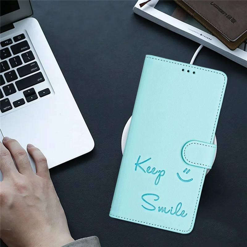 For Samsung Galaxy A16 5G / A16 4G Case Smile Imprinted RFID Blocking Leather Phone Cover with Strap - Mint Green
