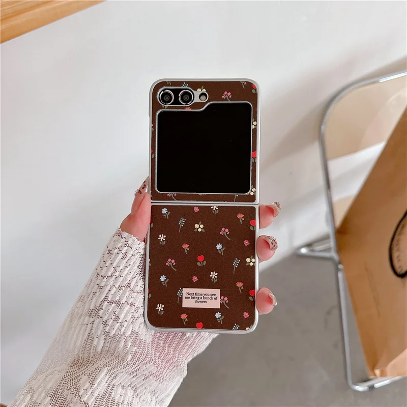 For Samsung Galaxy Z Flip7 FE 5G / Z Flip6 5G Case Leather+PC Floral Phone Cover with Hand Strap - Brown