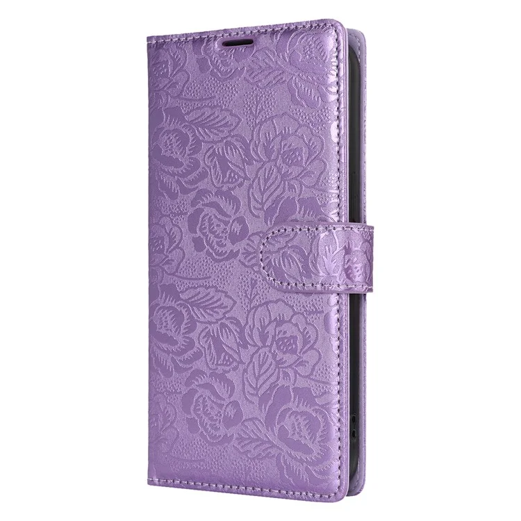 For iPhone 16 Pro Max Case with Hand Strap Flower Imprint Leather Wallet Phone Cover - Purple