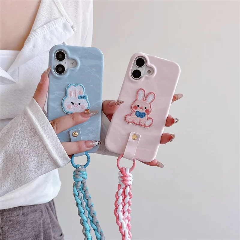 For iPhone 16 Plus Case Cute Pattern Soft PU+PC Phone Back Cover with Braided Handy Strap - Pink Rabbit