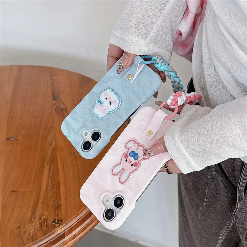 For iPhone 16 Plus Case Cute Pattern Soft PU+PC Phone Back Cover with Braided Handy Strap - Pink Rabbit