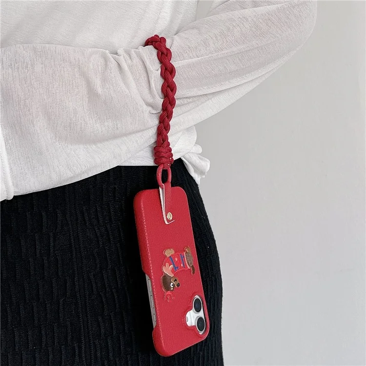 For iPhone 16 Plus Case Christmas Design Cute Dog Pattern PU+PC Phone Back Cover with Braided Handy Strap