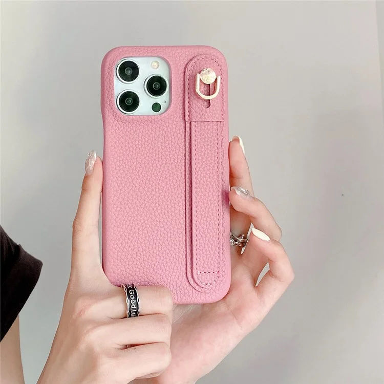 Capa para iPhone 14 Pro Max com suporte para pulso, em couro PU + capa de telefone PET - Rosa