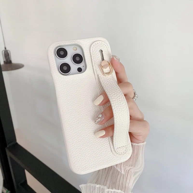 For iPhone 14 Pro Max Case Wristband Kickstand PU Leather + PET Phone Cover - White
