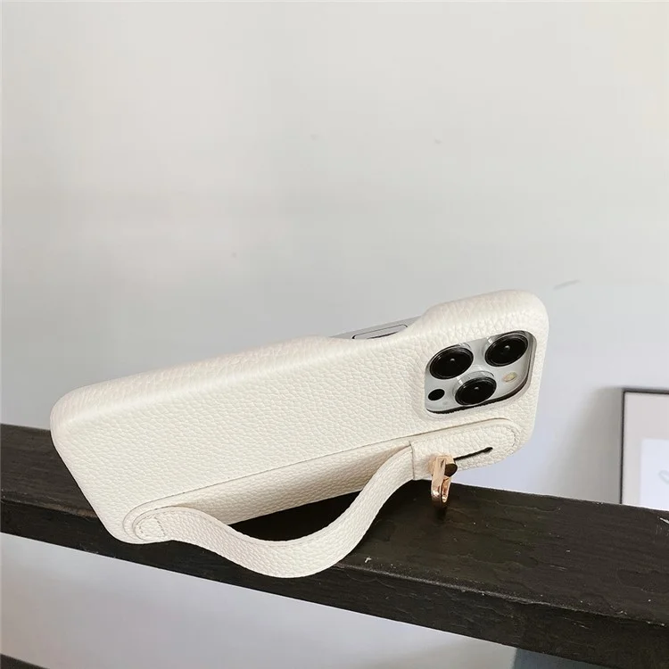 Étui pour iPhone 14 Pro avec sangle de poignet, support et couverture de téléphone en cuir PU + PET - Blanc