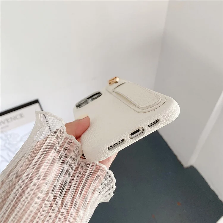 Étui pour iPhone 14 Pro avec sangle de poignet, support et couverture de téléphone en cuir PU + PET - Blanc