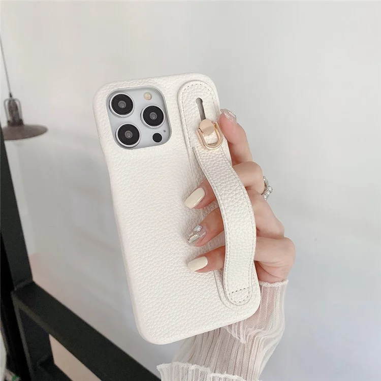 Étui pour iPhone 14 Pro avec sangle de poignet, support et couverture de téléphone en cuir PU + PET - Blanc
