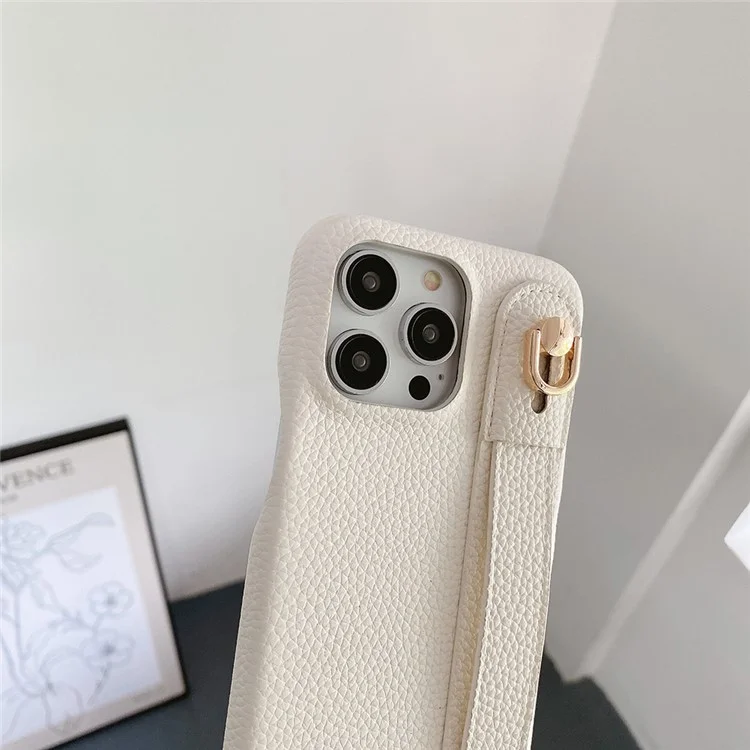 Étui pour iPhone 14 Pro avec sangle de poignet, support et couverture de téléphone en cuir PU + PET - Blanc