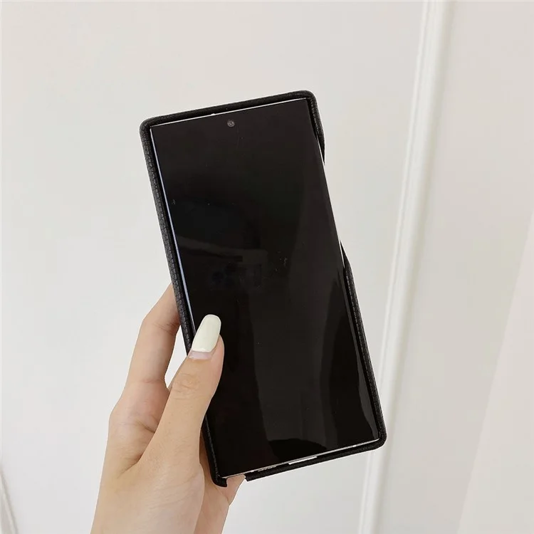 Capa para Samsung Galaxy S24 Ultra com slot para cartão, pulseira, suporte e cobertura de telefone em couro PU + PET - Preto