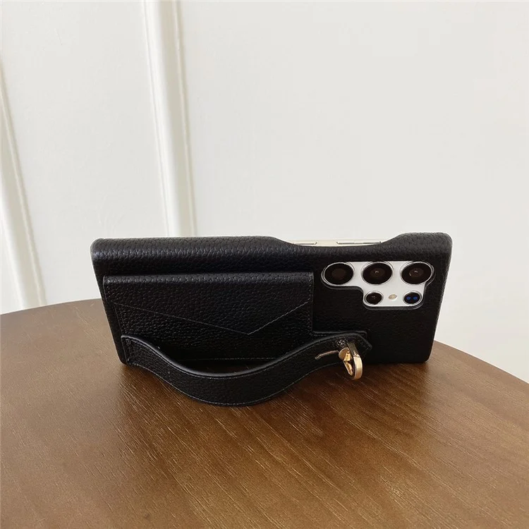 Capa para Samsung Galaxy S24 Ultra com slot para cartão, pulseira, suporte e cobertura de telefone em couro PU + PET - Preto
