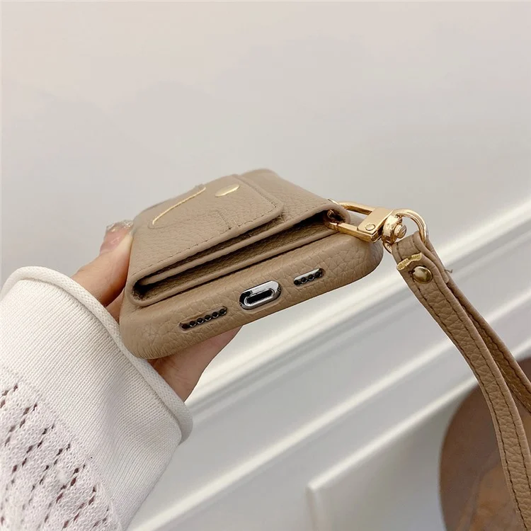 Étui pour iPhone 14 Pro Max, design miroir en cuir PU avec fentes pour cartes et dragonne - Marron clair
