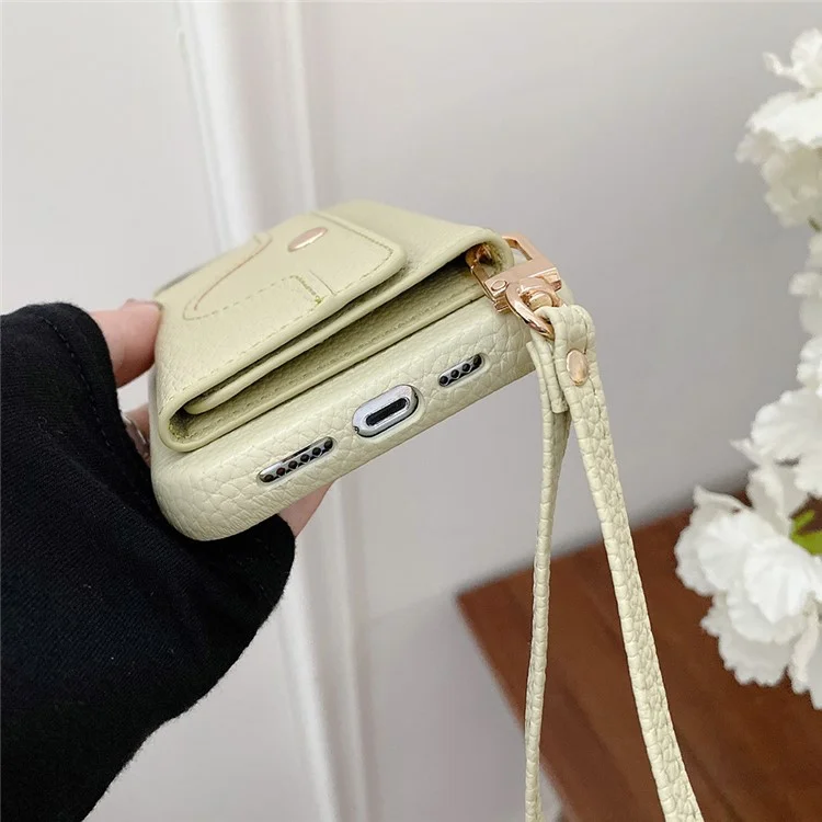 Für iPhone 14 Pro Hülle Spiegeldesign PU-Leder Rückseite mit Kartenfächern, Handgelenksband - Grün