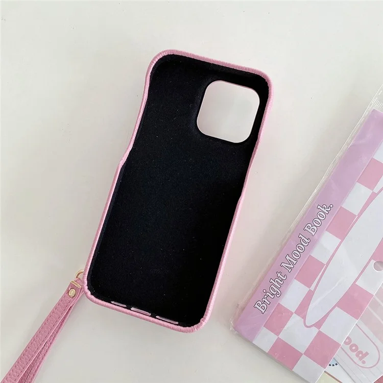 Custodia per iPhone 16 Pro Max con design a specchio, cover posteriore in pelle PU con slot per schede e cinturino da polso - Rosa