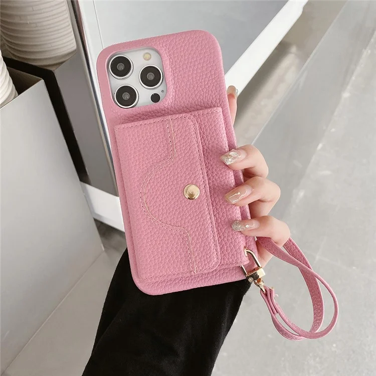 Custodia per iPhone 16 Pro Max con design a specchio, cover posteriore in pelle PU con slot per schede e cinturino da polso - Rosa