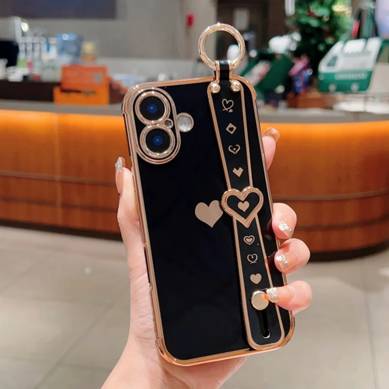 Capa para iPhone 16 Plus com pulseira, suporte, coração de amor, capa de TPU e suporte para dedo - Preto