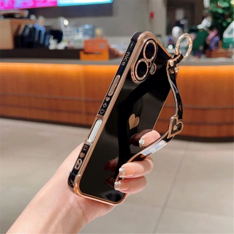 Capa para iPhone 16 Plus com pulseira, suporte, coração de amor, capa de TPU e suporte para dedo - Preto