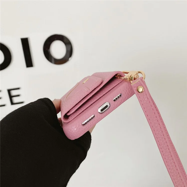 Funda para iPhone 15 Pro Max, diseño de espejo, cubierta trasera de piel sintética con ranuras para tarjetas y correa para la muñeca - Rosa