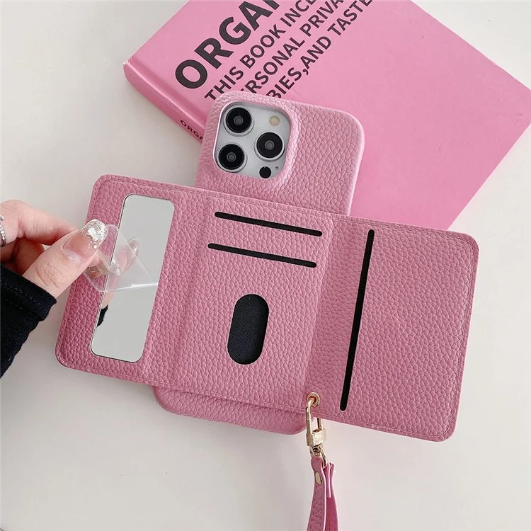 Funda para iPhone 15 Pro Max, diseño de espejo, cubierta trasera de piel sintética con ranuras para tarjetas y correa para la muñeca - Rosa