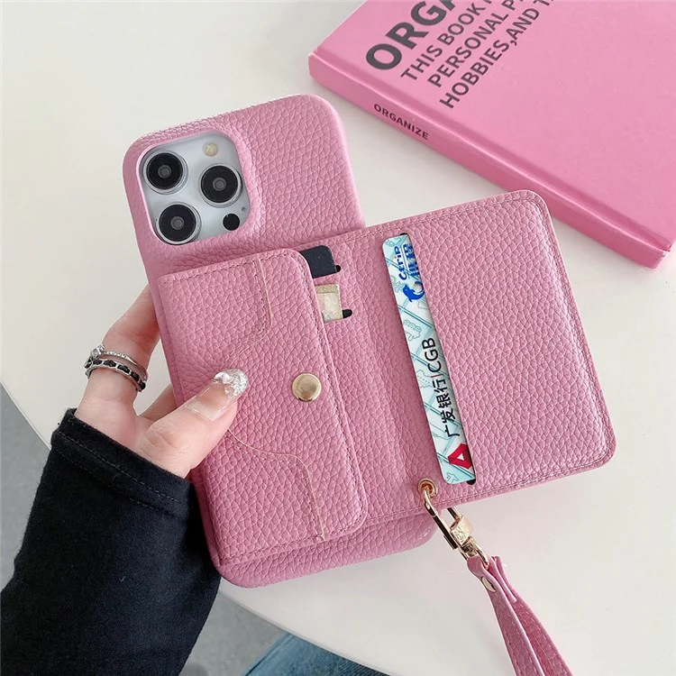 Funda para iPhone 15 Pro Max, diseño de espejo, cubierta trasera de piel sintética con ranuras para tarjetas y correa para la muñeca - Rosa