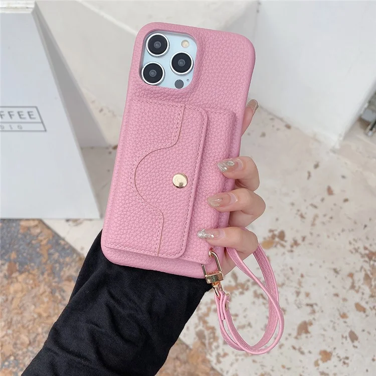 Funda para iPhone 15 Pro Max, diseño de espejo, cubierta trasera de piel sintética con ranuras para tarjetas y correa para la muñeca - Rosa