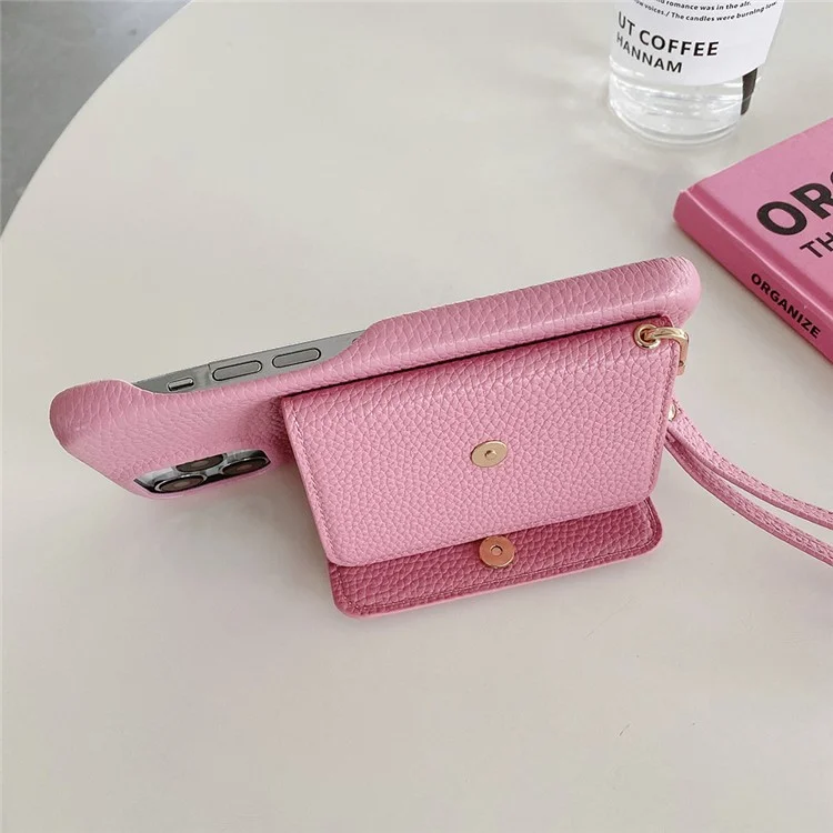 Funda para iPhone 15 Pro Max, diseño de espejo, cubierta trasera de piel sintética con ranuras para tarjetas y correa para la muñeca - Rosa