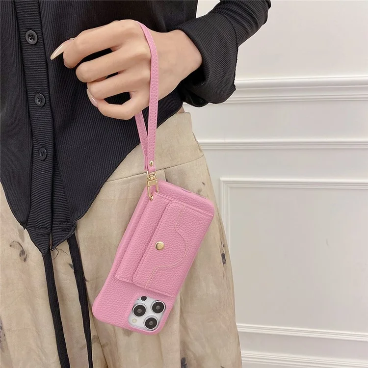 Funda para iPhone 15 Pro Max, diseño de espejo, cubierta trasera de piel sintética con ranuras para tarjetas y correa para la muñeca - Rosa