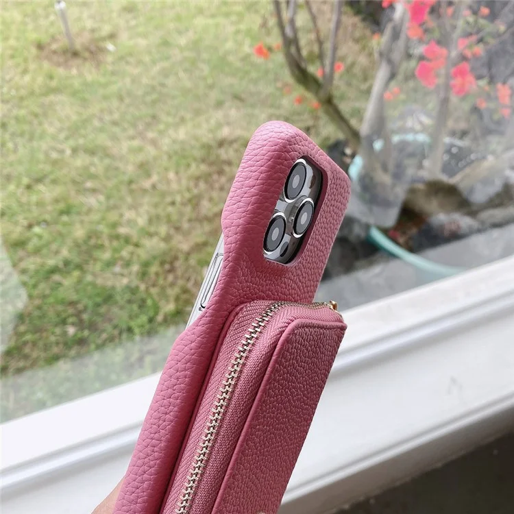 Custodia per iPhone 14 Pro Max con cerniera, slot per schede in pelle PU, cover posteriore del telefono con cinturino da polso - Rosa