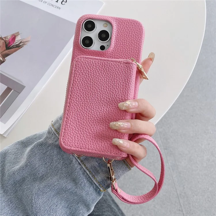Custodia per iPhone 14 Pro Max con cerniera, slot per schede in pelle PU, cover posteriore del telefono con cinturino da polso - Rosa