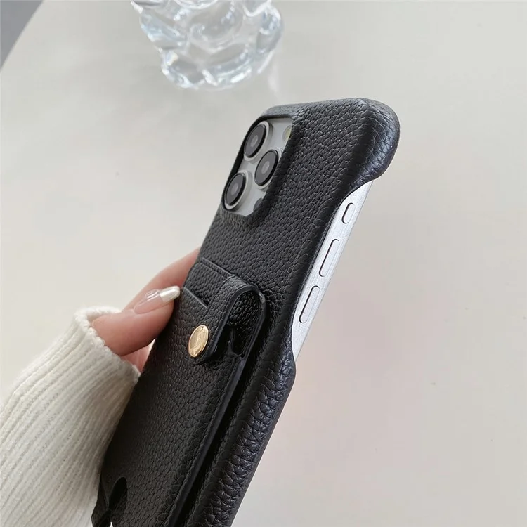 Funda para iPhone 15 Pro con múltiples ranuras para tarjetas, cubierta de cuero en la parte trasera y correa para la muñeca - Negro