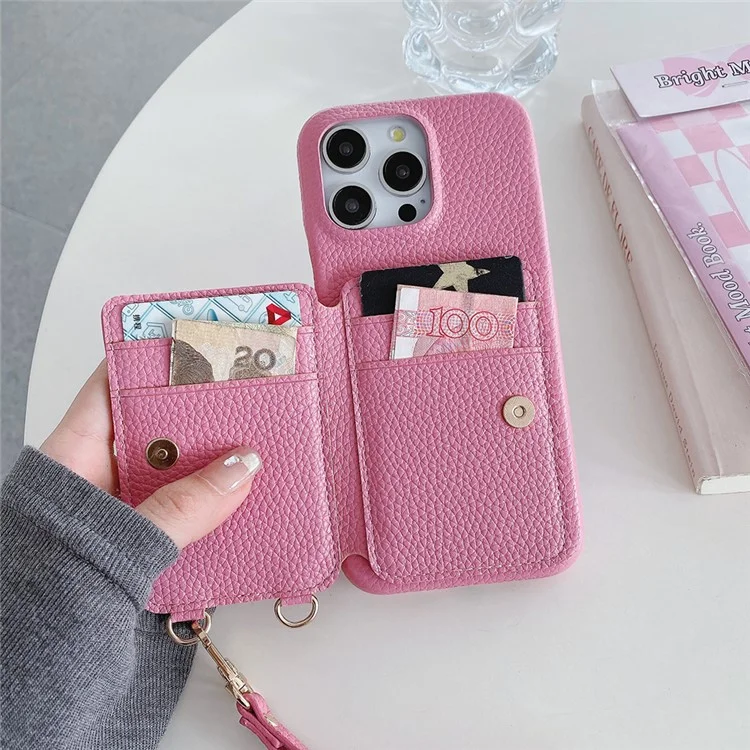 Capa para iPhone 14 Pro Max com slots para cartão, suporte dobrável, cobertura traseira de couro PU com suporte para anel, alça de pulso - Rosa