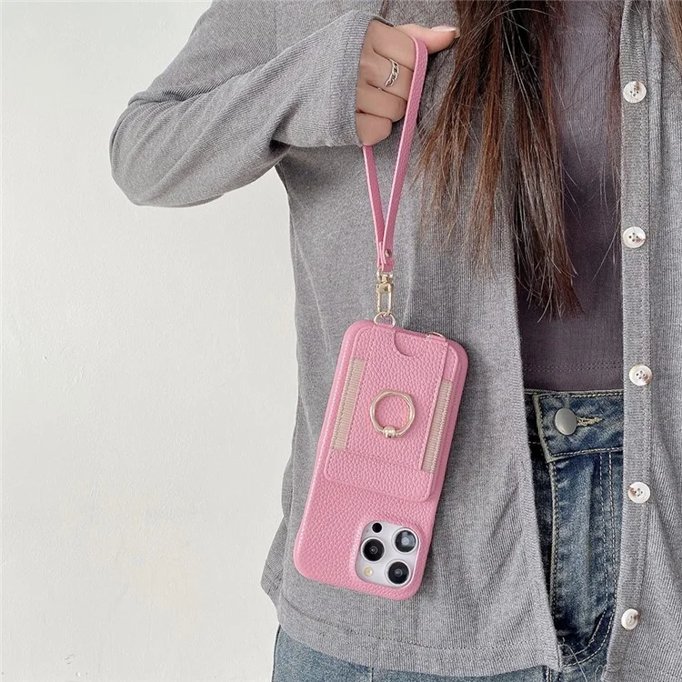 Capa para iPhone 14 Pro Max com slots para cartão, suporte dobrável, cobertura traseira de couro PU com suporte para anel, alça de pulso - Rosa