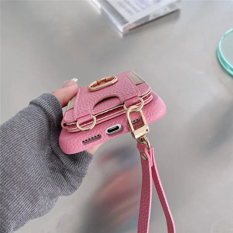 Capa para iPhone 14 Pro Max com slots para cartão, suporte dobrável, cobertura traseira de couro PU com suporte para anel, alça de pulso - Rosa