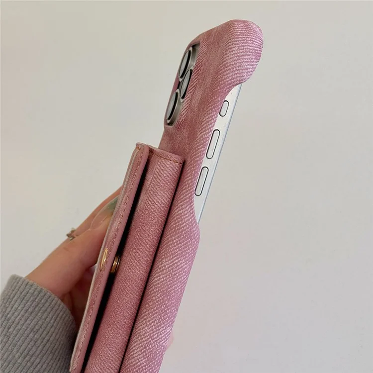 Funda para iPhone 15 Pro Max con ranuras para tarjetas, diseño de espejo, textura de tela de mezclilla y cuero sintético con correa - Rosa