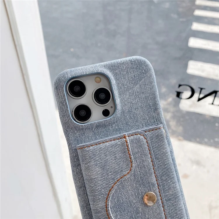 Étui pour iPhone 14 Pro Max avec fentes pour cartes, design miroir, texture en tissu jean et cuir PU avec sangle - Bleu bébé