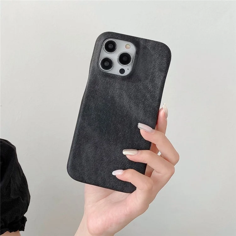 Custodia per iPhone 14 Pro in tessuto jeans con texture in pelle PU + cover posteriore in PET - Nero